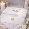 Personalisierte Erinnerungsbox aus Holz mit Sonnenuntergang Motiv und Gravur „Für immer in unseren Herzen“ als Trauerbox für persönliche Erinnerungsstücke